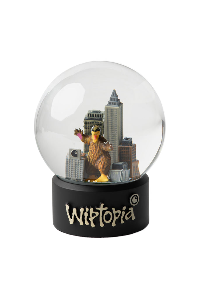 Wintopia snow globe with a cityscape and character inside on a white background