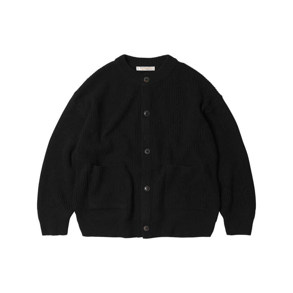 Black cardigan on a light gray background