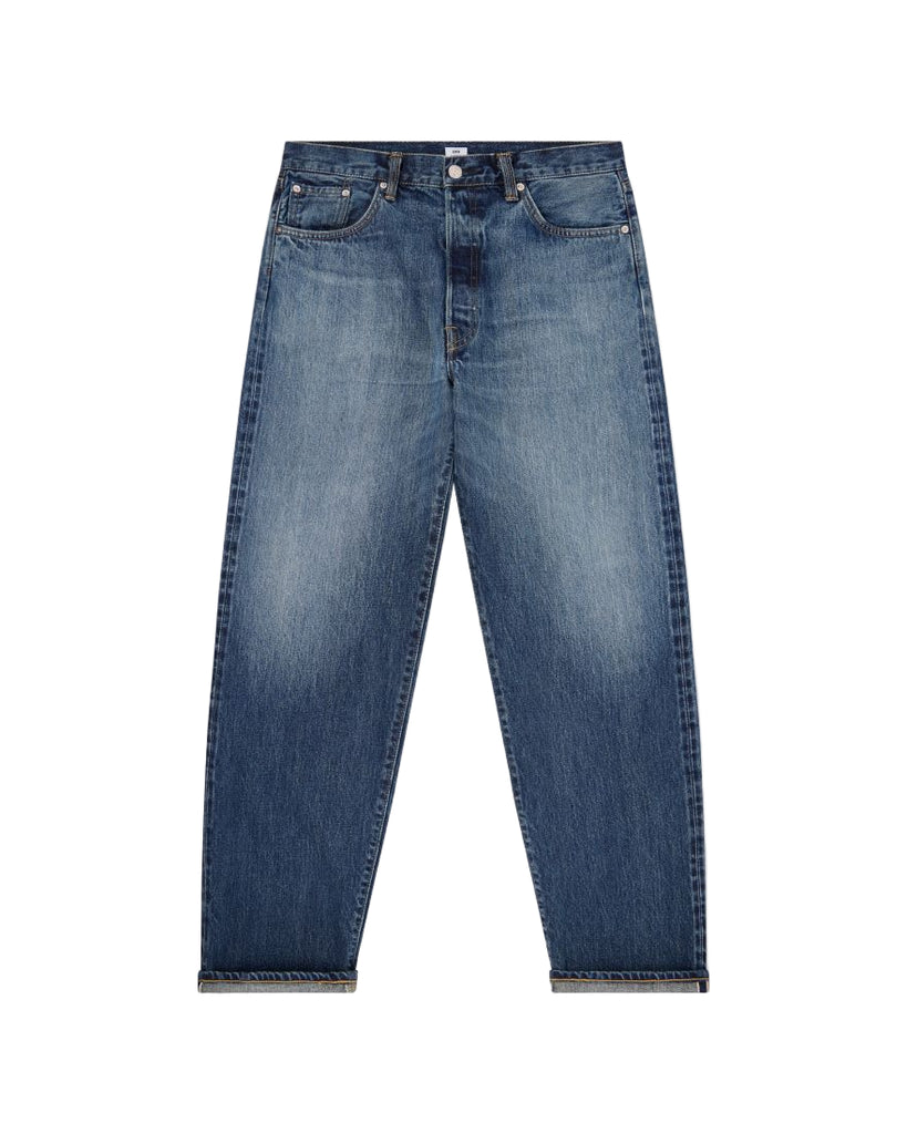 Blue jeans on a light gray background